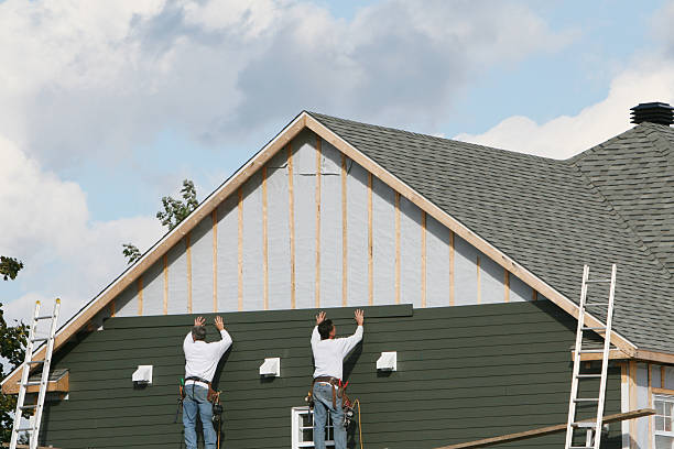Professional Siding technician working in Seville, OH